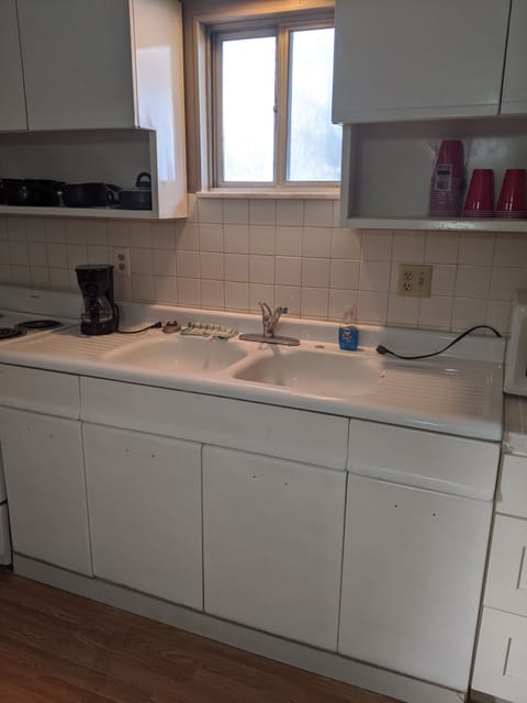 Kitchen sink. Original enameled cast iron.