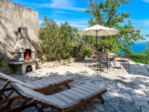 Sky, Property, Cloud, Furniture, Plant, Nature, Outdoor Furniture, Shade, Building, Umbrella
