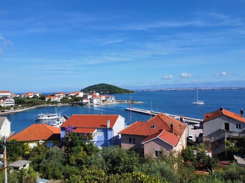 Water, Cloud, Sky, Building, Daytime, Property, Nature, Azure, Architecture, Coastal And Oceanic Landforms