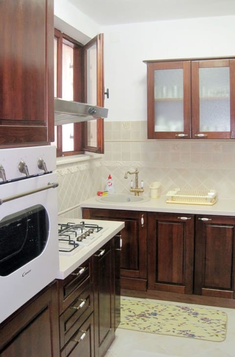 Countertop, Cabinetry, Room, Furniture, Kitchen, Property, Sink, Interior Design, Kitchen Stove, Major Appliance