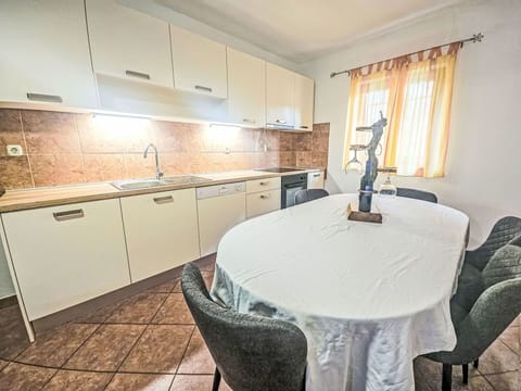 Furniture, Interior Design, Flooring, Floor, Wood, Room, Ceiling, Lighting, Home, Cabinetry