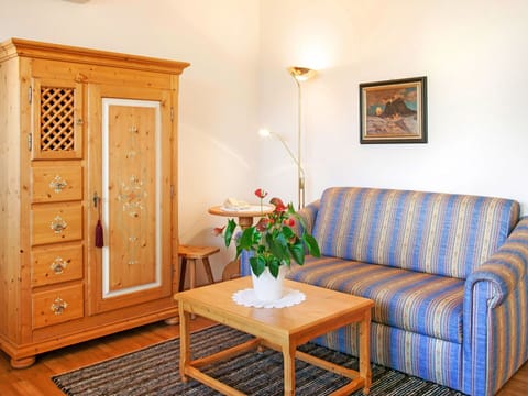 Table, Furniture, Cabinetry, Property, Plant, Picture Frame, Couch, Azure, Comfort, Vase