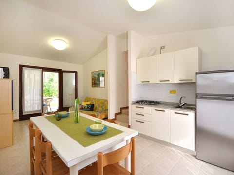 Property, Room, Furniture, Interior Design, Building, Kitchen, House, Yellow, Cabinetry, Real Estate