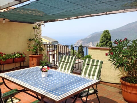 Table, Plant, Furniture, Building, Property, Chair, Flowerpot, Houseplant, Azure, Outdoor Table