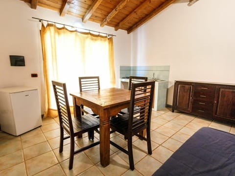 Table, Furniture, Property, Chair, Wood, Cabinetry, Interior Design, Window, Flooring, Wood Stain