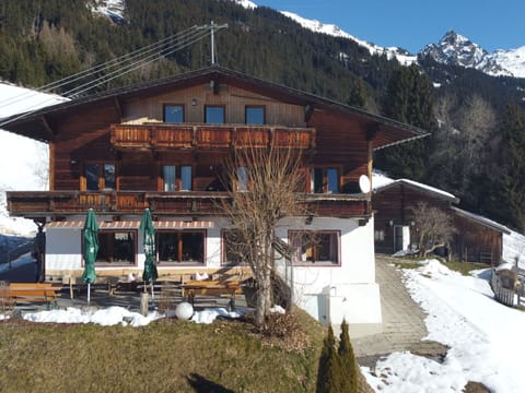 Property, Sky, Table, Wood, Shade, Floor, Outdoor Furniture, Chair, Flooring, Wood Stain