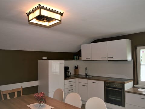 Cabinetry, Countertop, Furniture, Table, Kitchen Appliance, Sink, Kitchen Stove, Wood, Chair, Building