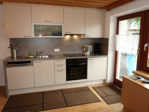 Cabinetry, Countertop, Property, Kitchen Sink, Sink, Kitchen Appliance, Kitchen Stove, Tap, Kitchen, Wood