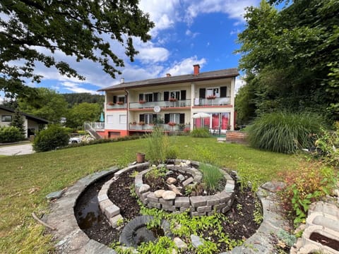 Plant, Sky, Cloud, Building, Property, Nature, Window, Tree, Natural Landscape, Grass