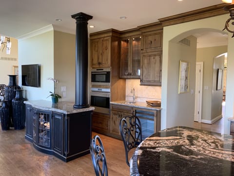 Wet bar and Wolf steam oven and convection oven