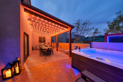 Outdoor dining area with private hot tub!