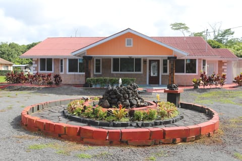 Front view of the house and circular driveway