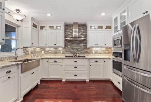 Beautiful updated kitchen with gas cook top and farmhouse sink!