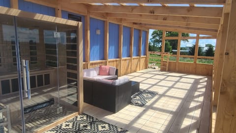 sunroom with sauna and sittitg area!