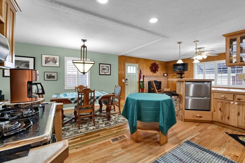 The Open Concept between Kitchen, Dining and Family Area keeps Conversations Flowing Freely between Everyone who visits.