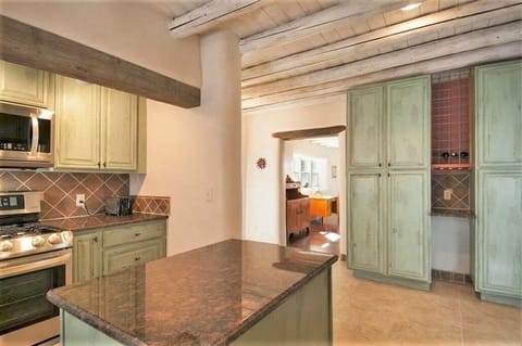 Modern kitchen w/ island & tons of cabinets (looking towards Living room)