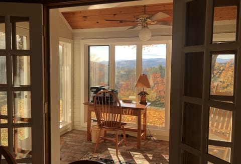 Catch up with the office while enjoying the view in the 3 season room.