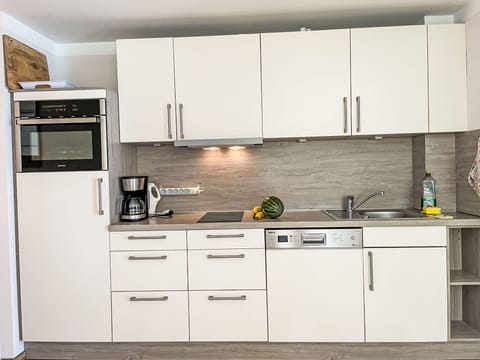 Kitchen Appliance, Kitchen, Countertop, Cabinetry, Major Appliance, Furniture, Flooring, Home Appliance, Wood, Interior Design