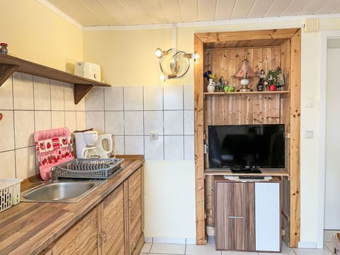 Furniture, Wood, Interior Design, Flooring, Floor, Cabinetry, Room, Cupboard, Ceiling, Wood Stain