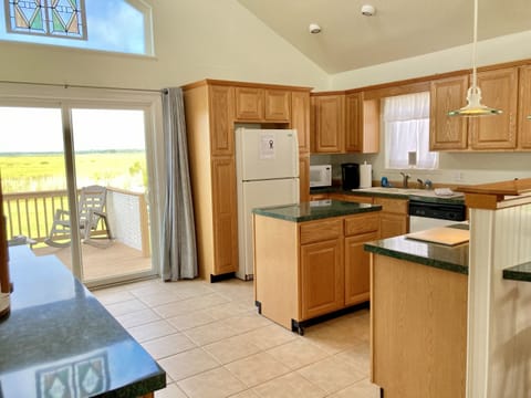 Deck off of upstairs kitchen