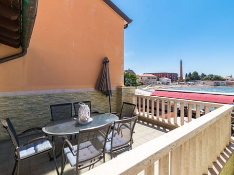 Property, Furniture, Table, Sky, Building, Chair, Wood, Outdoor Furniture, Plant, Architecture