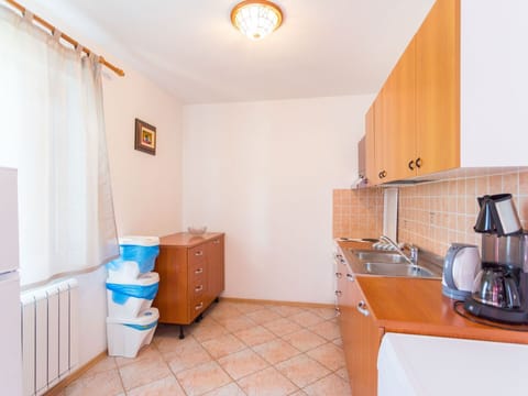 Property, Cabinetry, Building, Wood, Drawer, Interior Design, Kitchen Appliance, Floor, House, Mixer