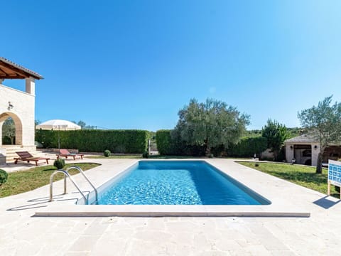 Water, Sky, Plant, Azure, Swimming Pool, Shade, Rectangle, Grass, Tree, Residential Area