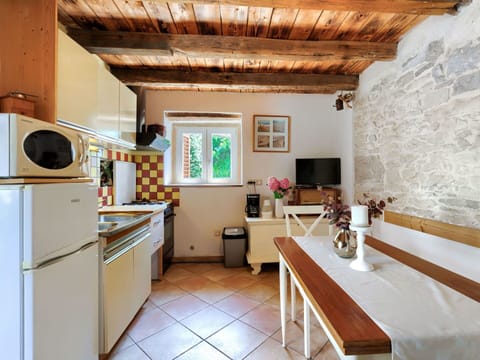 Furniture, Wood, Lighting, Cabinetry, Interior Design, Floor, Flooring, Building, Houseplant, Home Appliance