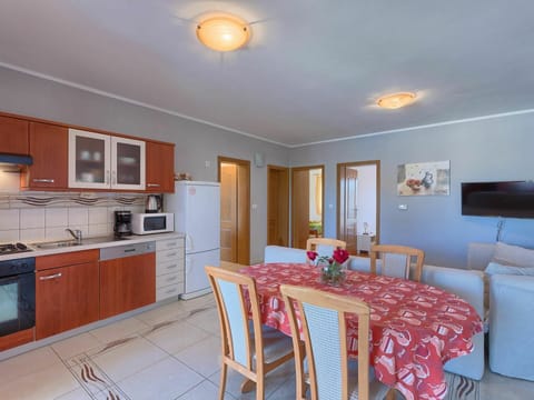 Furniture, Property, Cabinetry, Table, Building, Countertop, Wood, Lighting, Chair, Interior Design