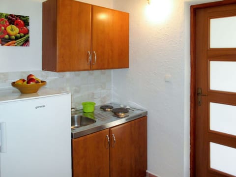 Cabinetry, Countertop, Furniture, Kitchen Sink, Sink, Kitchen Appliance, Kitchen, Building, Wood, Lighting