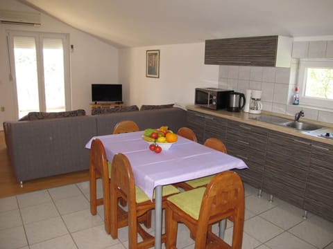 Plant, Furniture, Property, Window, Chair, Building, Wood, Lighting, Flowerpot, Architecture