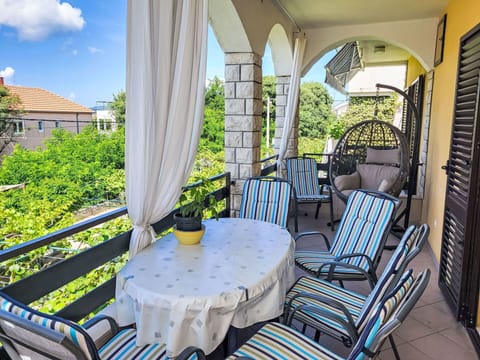 Table, Property, Furniture, Plant, Building, Sky, Cloud, Chair, Shade, Interior Design