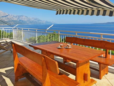 Furniture, Table, Property, Outdoor Table, Outdoor Furniture, Room, Deck, Hardwood, Real Estate, Architecture