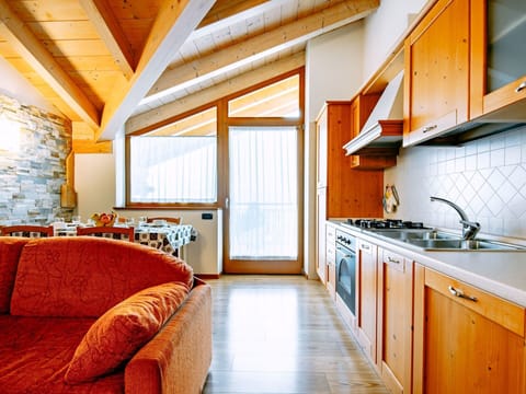 Cabinetry, Furniture, Sink, Countertop, Building, Wood, Orange, Kitchen Stove, Kitchen Sink, Lighting