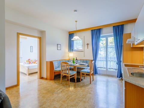 Table, Property, Furniture, Azure, Wood, Interior Design, Flooring, Floor, Window, Chair