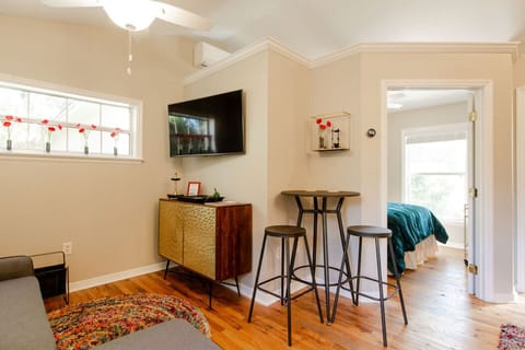 Living Area with breakfast Table that doubles as a computer work station.