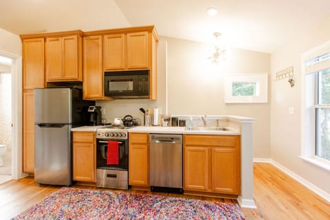 Full kitchen with all the essentials including a coffee bar