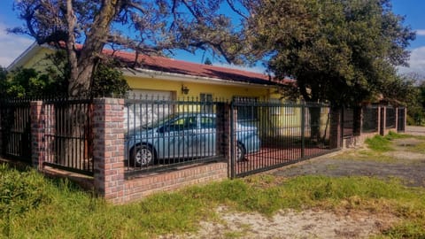 The driveway, with ample secure, gated parking space