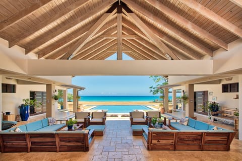 Open-air Caribbean living with the pool and sea just beyond.