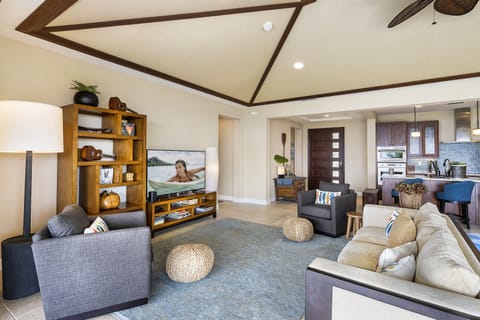 Holua Kai 23 Great Room with armchairs, couches, and a flat-screen TV.