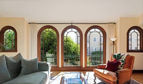 Living room with Southern exposure brings in light all day long. 