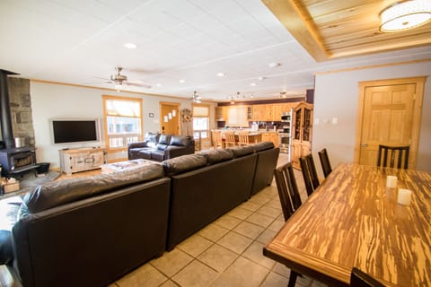 Dining area behind main couch. Need more chairs...check the closet in hall.