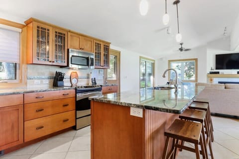 Spacious kitchen open to living and dining area.