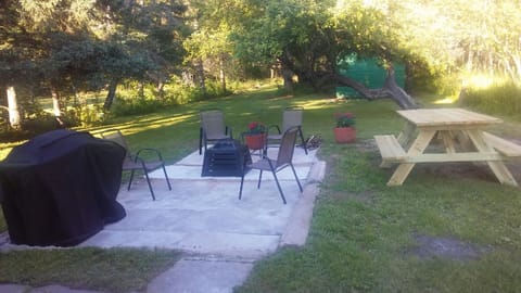 Outdoor patio located behind the house.