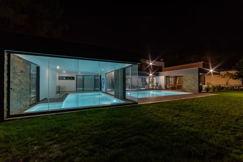 Indoor and outdoor pools (night)