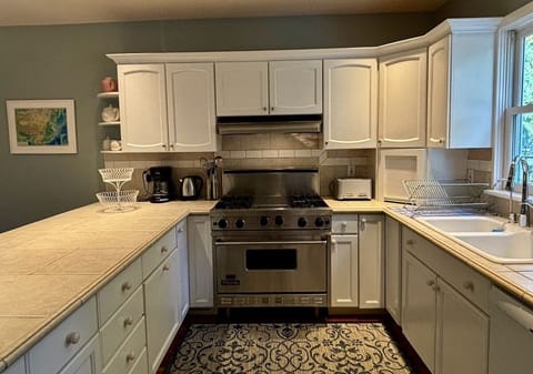 View of Viking stove and microwave.