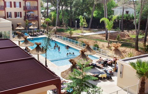 Spend time with family and friends in the outdoor pool during the summer.