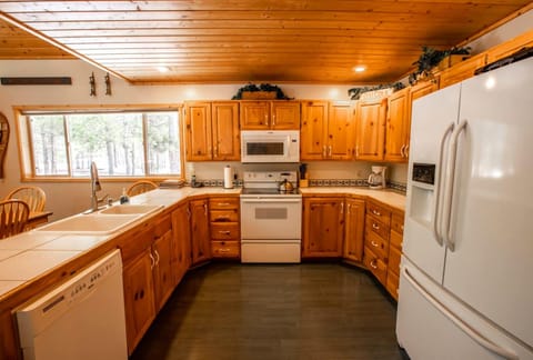 Large kitchen with plenty of prep space is perfect for large family gatherings!