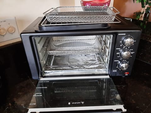 Air fryer, microwave, grill upstairs, full size oven in the bottom level