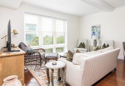 Living room with floor to ceiling windows